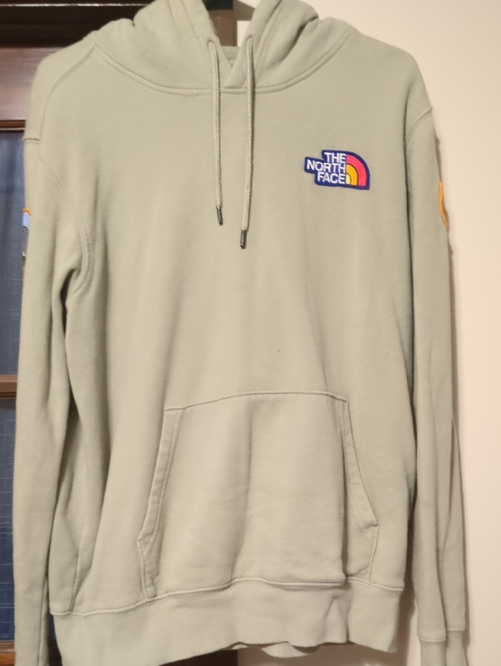 The North Face Men’s Sage Green Pullover Hoodie with Rainbow Logo